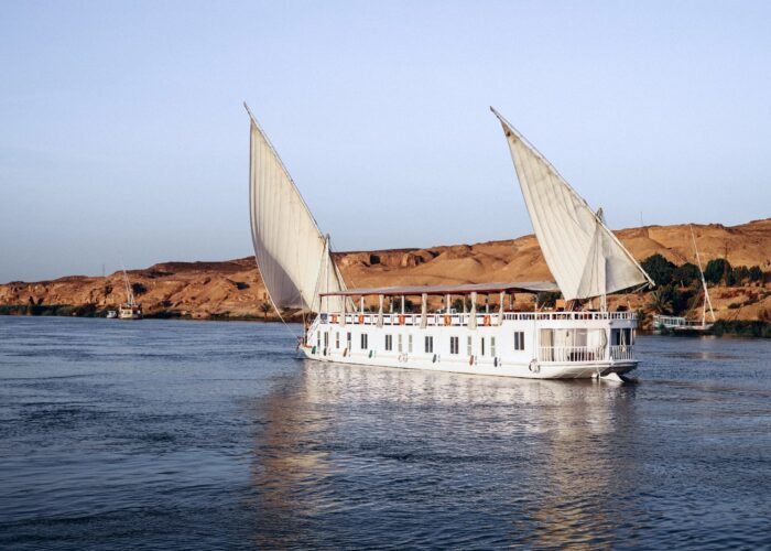 A traditional Dahabiya sailing boat on the Nile during a Dahabiya Nile cruise from Luxor.