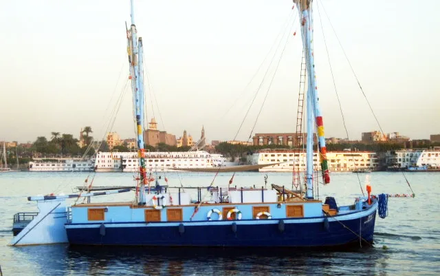 A traditional Sandal sailing boat on the Nile during a Sandal Nile cruise from Aswan.